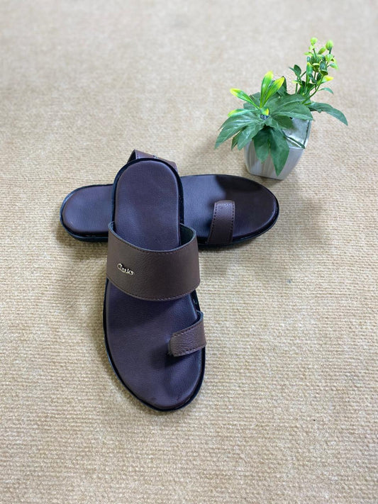 Premium men’s leather slippers with plush lining, perfect for home and casual outings. Lightweight and stylish design.