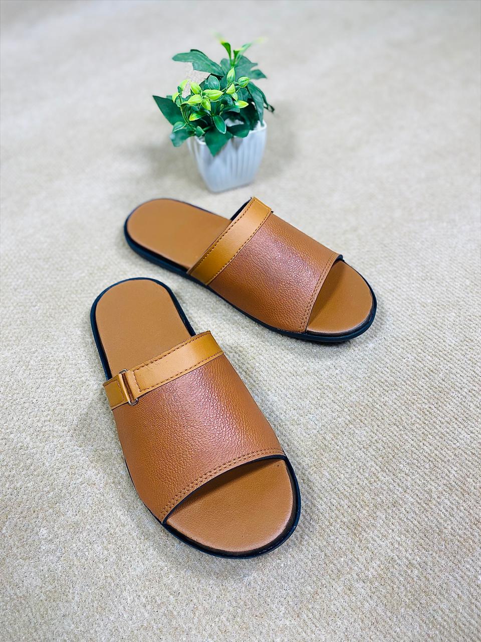 Soft cushioned men’s slippers with anti-slip soles for indoor and outdoor wear. Comfortable house slippers in multiple sizes.